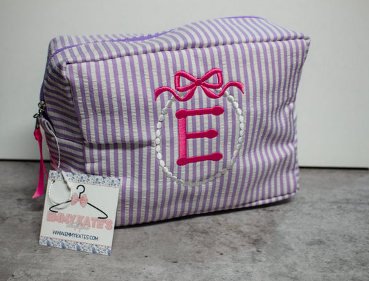 Purple seersucker cosmetic bag