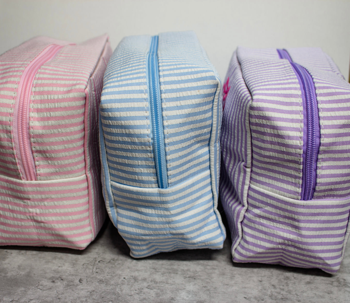 Green seersucker cosmetic bag